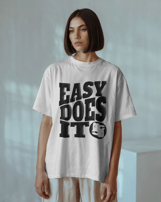 S: "EASY DOES IT TEE"